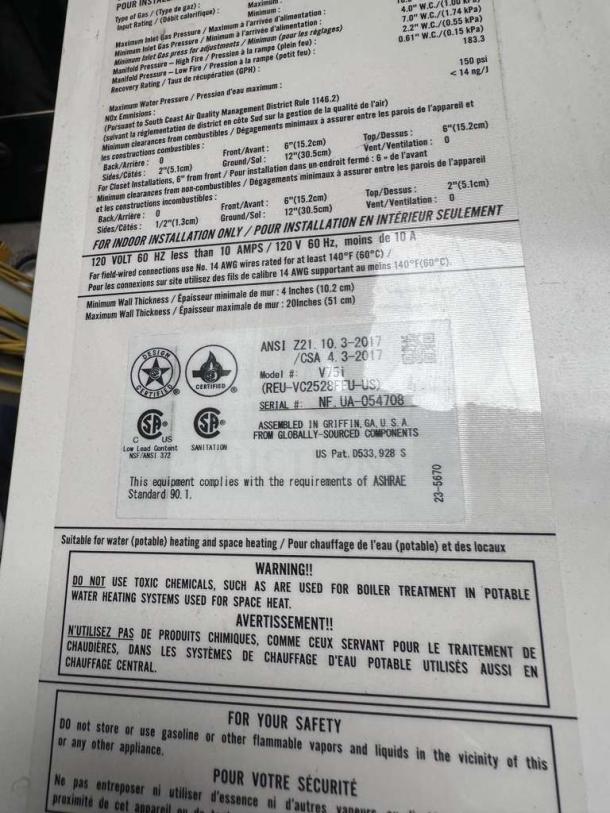 Rinnai V75iN Tankless Water Heater, 7.5 GPM, 180,000 BTU, natural gas, indoor use. Label shows compliance and safety warnings.