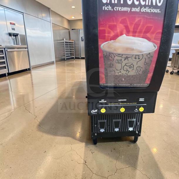Wilbur Curtis 3-station cappuccino dispenser model CAFEPC3CS10000, in superior condition, fully tested and operational.