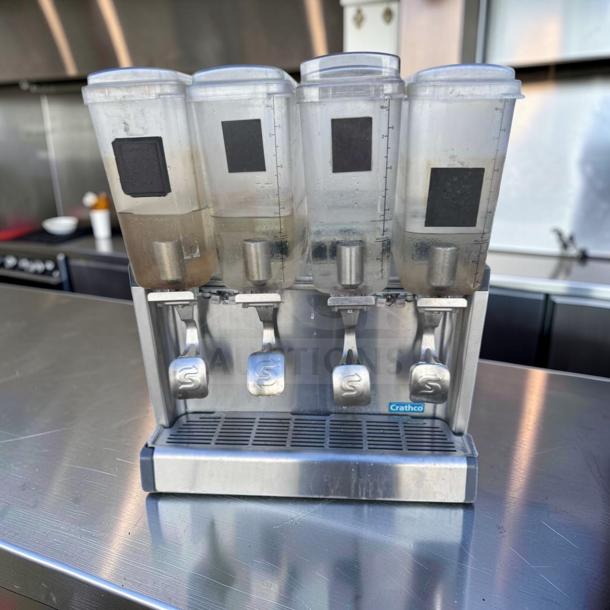 Crathco CS-4E-16-290 refrigerated drink dispenser, 4-bowl pre-mix system, stainless steel, fully operational, 120V.