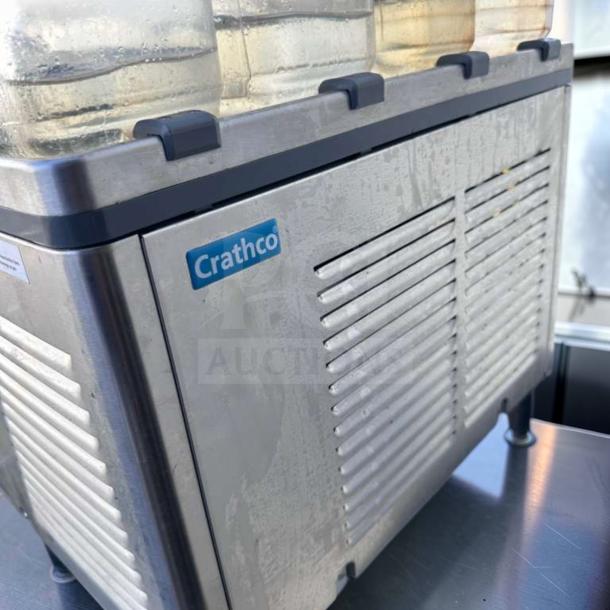 Crathco CS-4E-16-290 refrigerated drink dispenser with 4 bowls, stainless steel body, and visible logo, in superior condition.