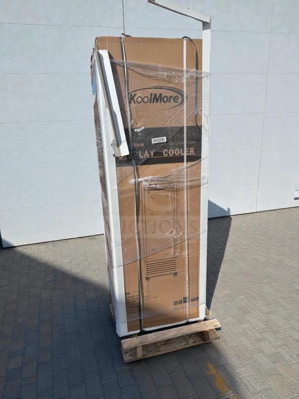 Brand new KoolMore Commercial Glass Door Display Refrigerator in packaging. Scratch & Dent condition. Model MDR1GD12C.