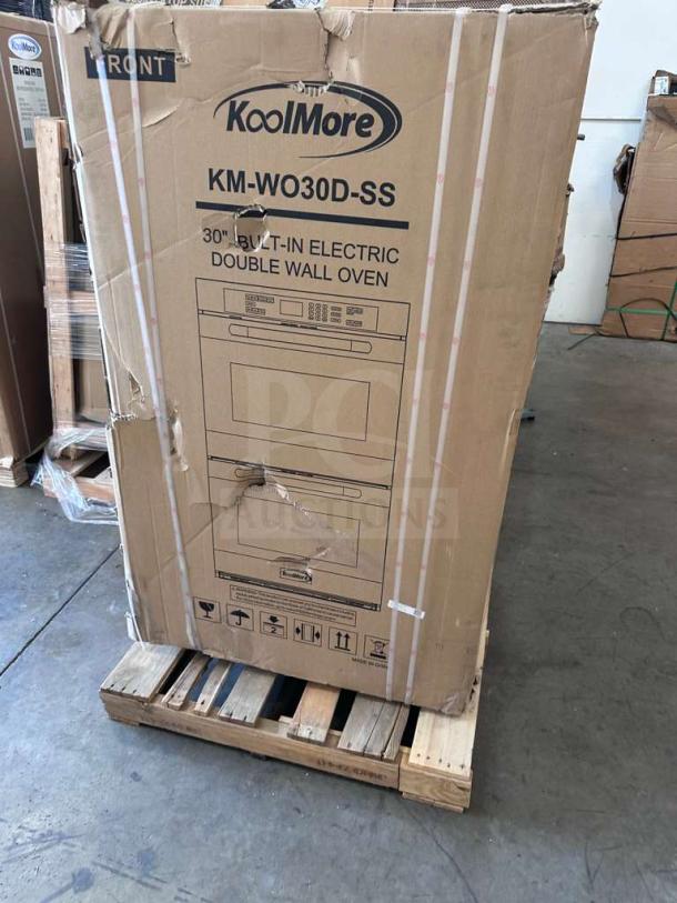 KoolMore KM-WO30D-SS 30" Electric Double Wall Oven in original packaging, scratch and dent condition, model visible on box.