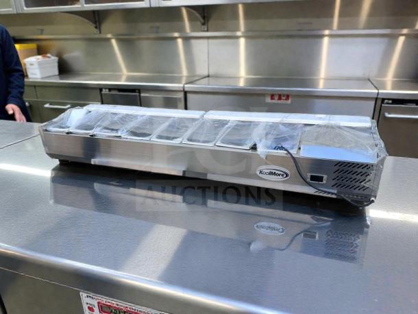 Brand new KoolMore refrigerated countertop prep rail, model SCDC-8P-SG, 8-pan capacity, glass sneeze guard, UL Listed.