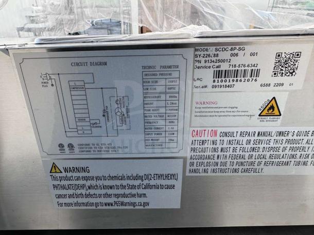 Label on KoolMore SCDC-8P-SG refrigerated prep rail box, showing circuit diagram, technical specs, and safety warnings.