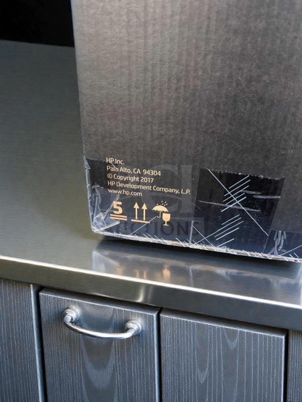 Brand new HP Engage One AIO POS System, Model 145, in original box. Features commercial touchscreen and UL listing.