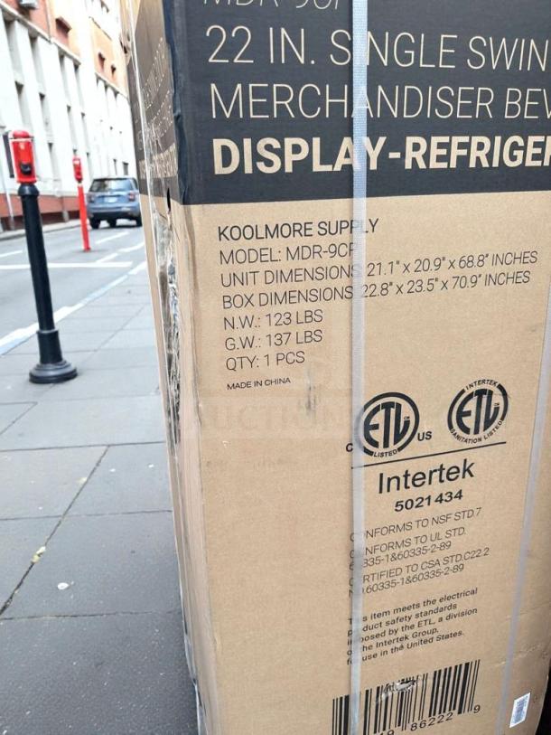 Boxed KoolMore MDR-9CP Electric Merchandiser Refrigerator, 9 Cu. Ft., with visible ETL and Intertek certifications. Brand new with minor scratches.