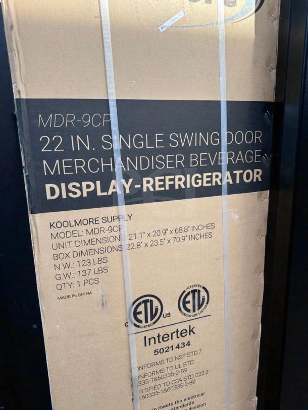 KoolMore MDR-9CP Electric Merchandiser Refrigerator, 9 Cu. Ft., single swing door, brand new, scratch & dent. Box shows dimensions and ETL certification.