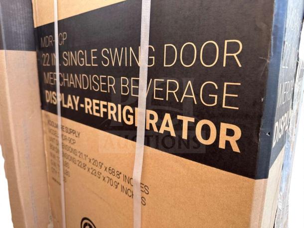 Brand new KoolMore MDR-9CP electric merchandiser refrigerator in box, 9 cu. ft., single swing door, slight scratches.
