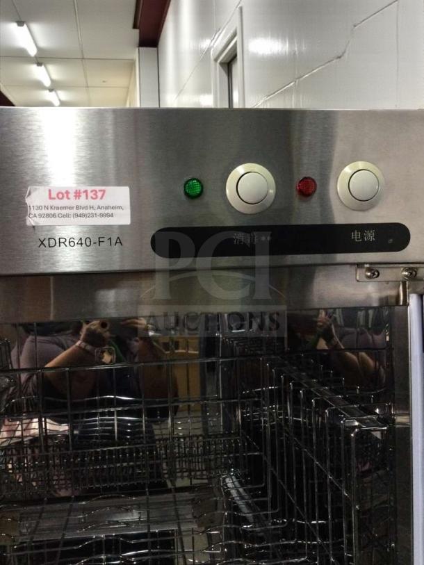 Commercial XDR640-F1A stainless steel sterilizer cabinet with visible control buttons, label Lot #137, excellent condition.