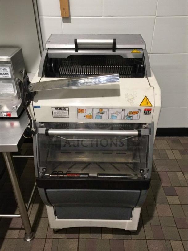 JAC KG-12FS commercial bread slicer, 115V, single phase, refined condition, fully tested, with safety and operation labels.