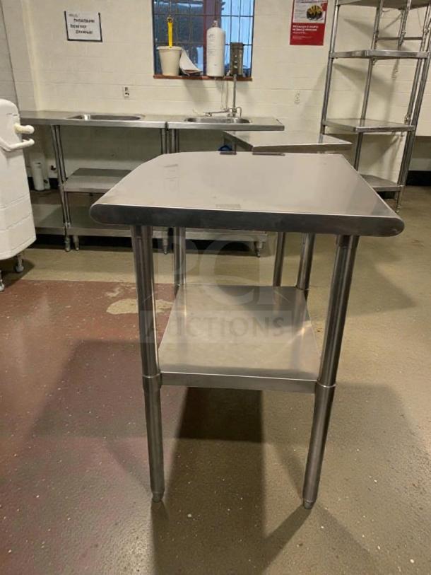 Stainless steel commercial prep table in superb condition, heavy-duty, inspected model SST-S-PREP-0064, featuring a lower shelf.