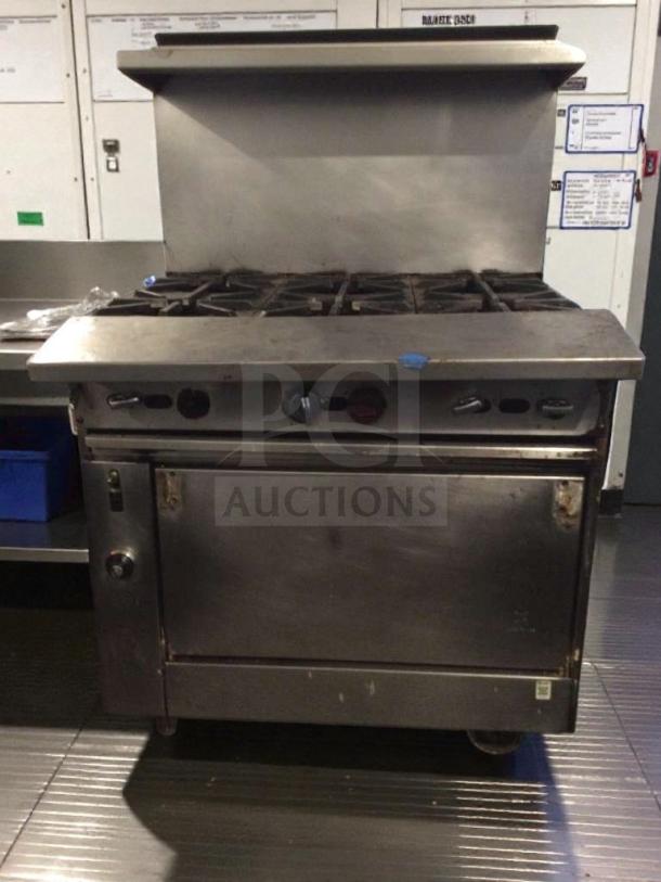 Commercial grade 6-burner gas range with oven, stainless steel, model GEN-L-RNG-0277, fully tested and working, premium condition.