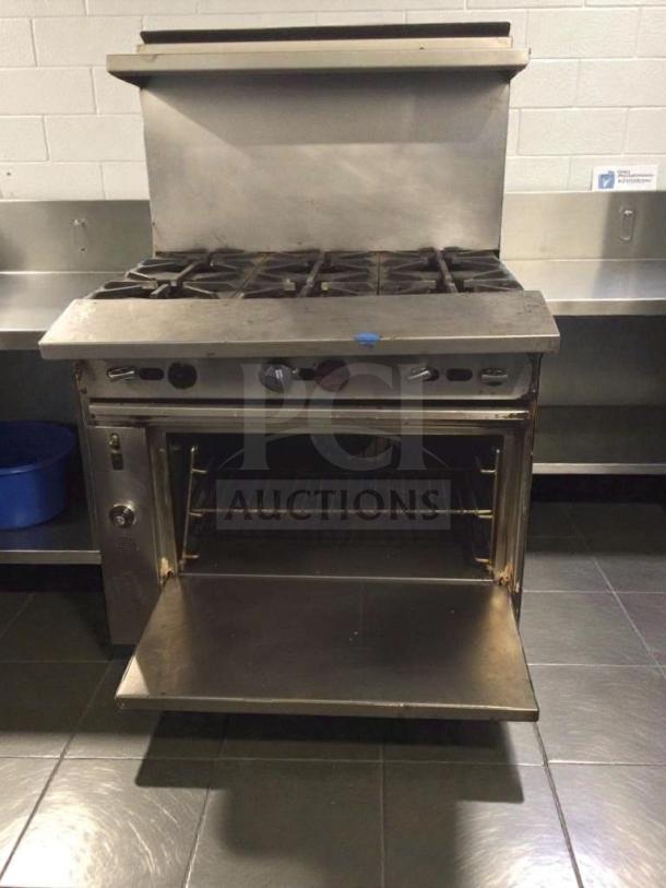 Commercial 6-burner gas range with oven, stainless steel, premium condition, fully tested and working, model GEN-L-RNG-0277.