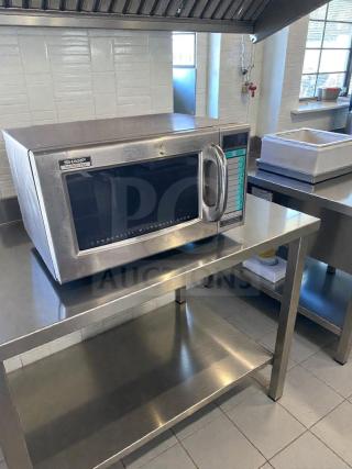 Sharp R-21LV commercial microwave, 1000W, stainless steel, excellent condition, fully tested, visible control panel.