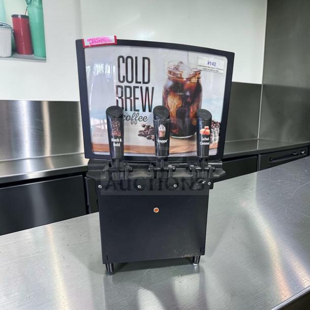 Excellent condition GoodWest GW2/GW3 cold brew dispenser, 115V, with labels for Black & Bold, Frappe, Salted Caramel.