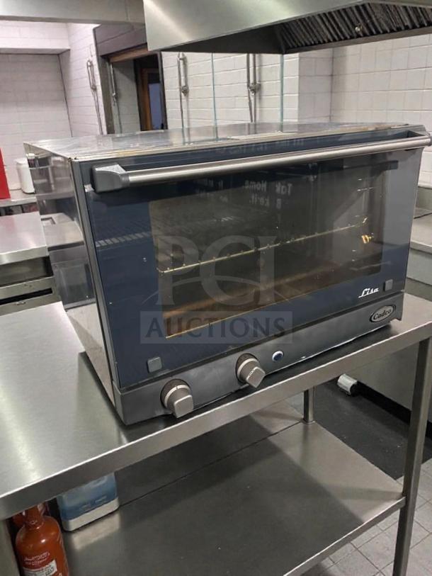 Cadco OV-013 commercial countertop convection oven, fully tested, like new condition, NSF & UL listed, dual knobs, glass door.