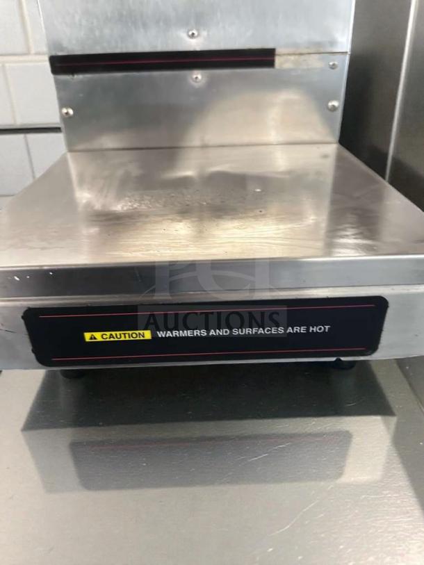 Cecilware JVA20B commercial hot beverage dispenser, stainless steel, fully operational, UL listed, "Caution: Warmers are hot" label.