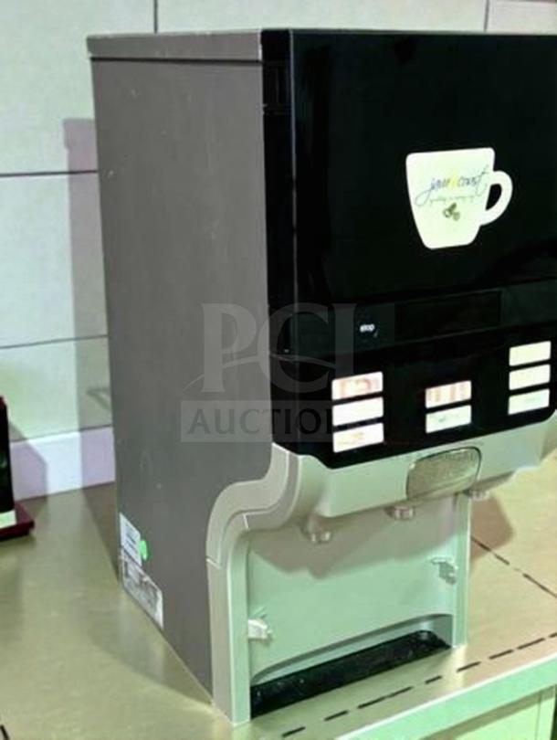 Select Brew NG-300 commercial coffee system in top-tier condition, fully operational. Features multiple selection buttons and a sleek design.