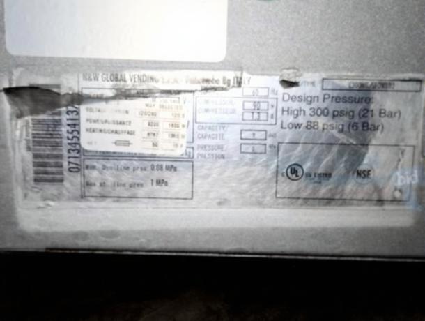 Label on Select Brew NG-300 coffee system detailing voltage, power, pressure ratings, and certification marks. Fully tested operational unit.