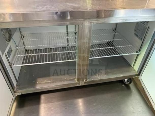 Avantco 60" two-door pizza prep refrigerator, stainless steel, prime condition, UL Listed, with shelving, fully operational.