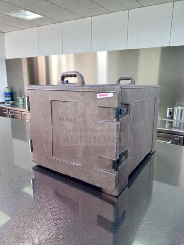 Carlisle Insulated Food Carrier, commercial model, impeccable condition, black, sturdy handles, visible Carlisle logo.