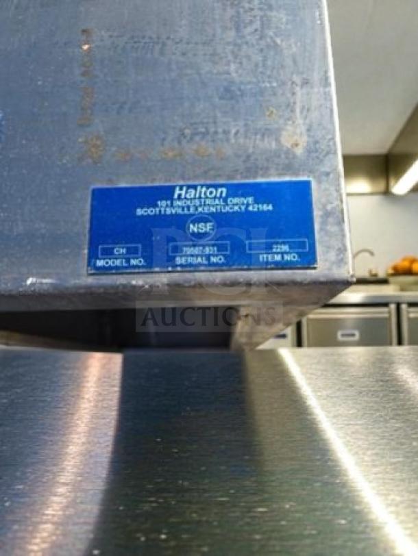 Halton commercial stainless steel vent hood, model HAL-L-VENT-0534, with visible blue label showing item and serial numbers.