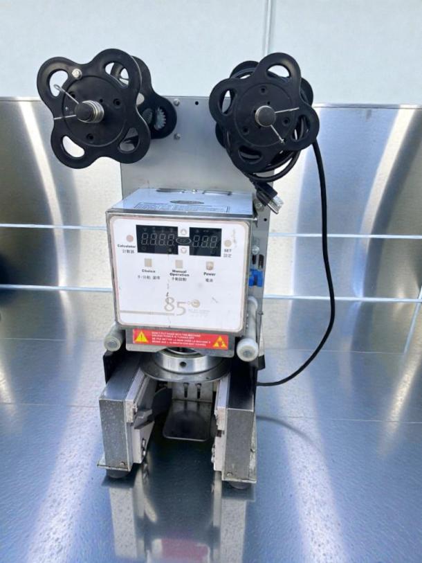 Impressive condition 85°C Digital Cup Sealer by Commercial Beverage Equipment, fully tested, automatic operation, model CUP-M-SEAL-0541.