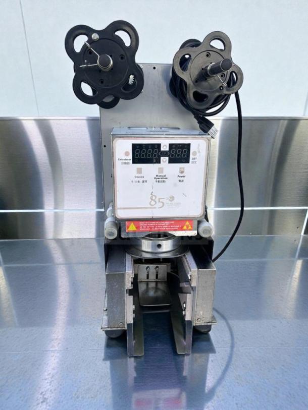 Impressive condition 85°C digital cup sealing machine by Commercial Beverage Equipment. Fully tested, operational, model CUP-M-SEAL-0541.