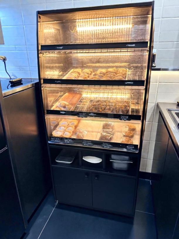 Turbo Air Bakery Display Case in outstanding condition, model TA-L-BDC-0512. LED lit, glass showcase, fully operational.