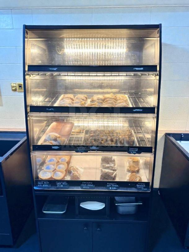 Turbo Air refrigerated bakery display case, model TA-L-BDC-0512, in outstanding condition. LED lit, glass merchandiser, fully operational.