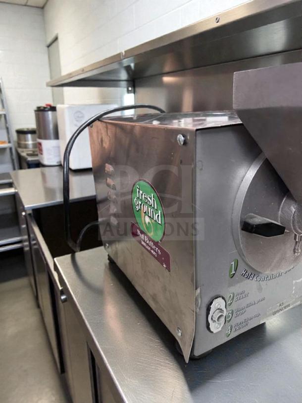 Olde Tyme PN2 commercial nut butter grinder in outstanding condition, UL listed, fully tested, and operational, with visible control panel and brand label.