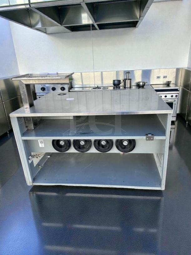 Commercial heated holding cabinet with overhead heat shelf, 48" pass-through station, excellent condition, fully operational.