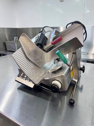 Bizerba N-22 commercial meat slicer in exceptional condition, 120V, fully operational, featuring precise controls.