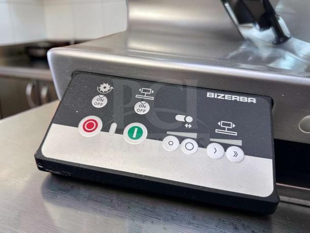 Bizerba N-22 commercial slicer control panel, in exceptional condition, with labeled operational buttons for easy use.