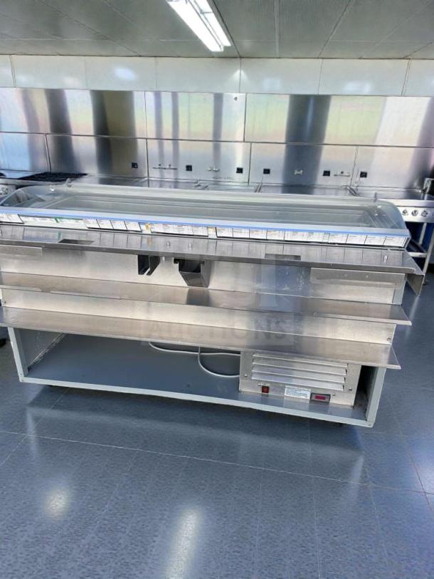 Commercial refrigerated deli display case with glass sneezeguard, excellent condition, fully tested and operational.