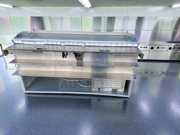 Commercial refrigerated deli display case with glass sneezeguard, excellent condition, fully tested, stainless steel finish.