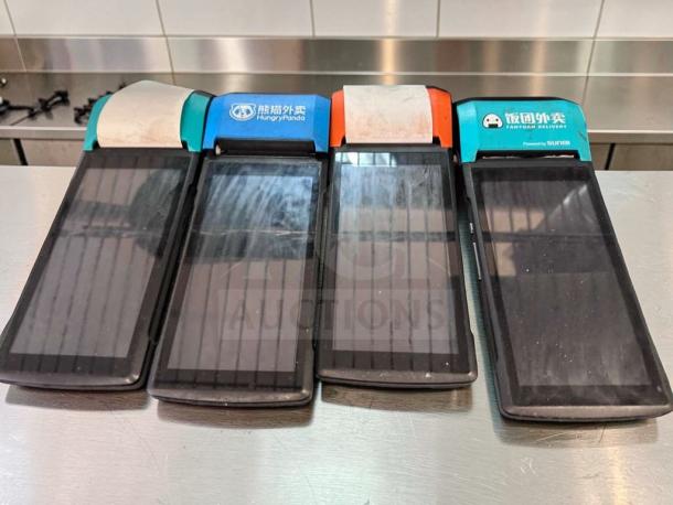 Set of 4 Sunmi V2 wireless POS terminals with built-in receipt printers, in outstanding condition, ideal for restaurant mobile ordering.