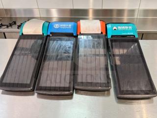 Set of 4 Sunmi V2 wireless POS terminals with built-in receipt printers, in outstanding condition, ideal for restaurant mobile ordering.