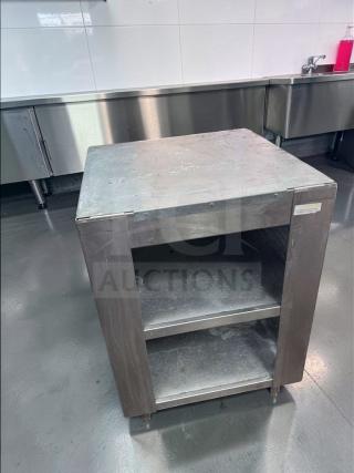 Commercial stainless steel equipment stand, excellent condition, with open shelf storage. Model: COM-S-STD-0687. Heavy-duty, ready for use.
