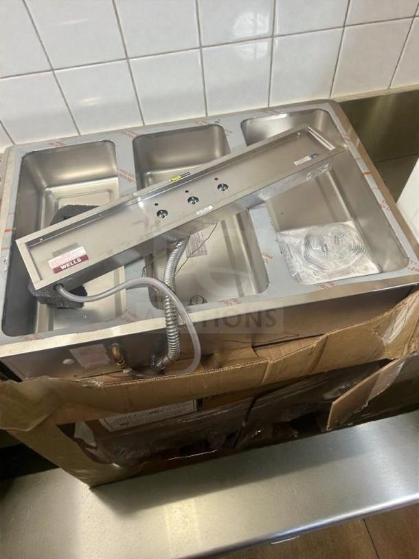 Outstanding condition Wells MOD-327TD 3-well electric food warmer, built-in top mount, 43" stainless steel, operational.