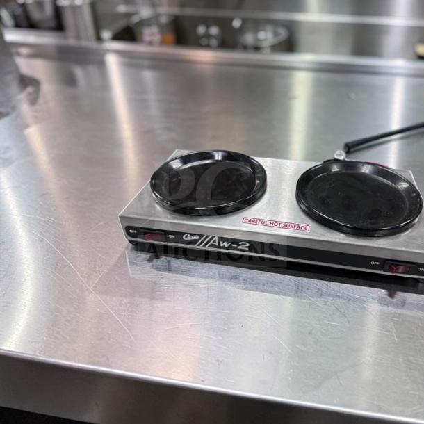 Curtis AW-2-10 two burner coffee decanter warmer, stainless steel, excellent condition, 120V, with "Careful Hot Surface" label.