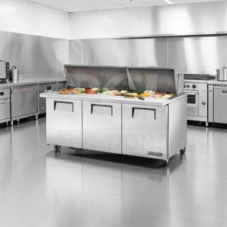 Elite condition True TSSU-72-30M-B-ST-HC 72” sandwich prep table, stainless steel, refrigerated, fully operational.