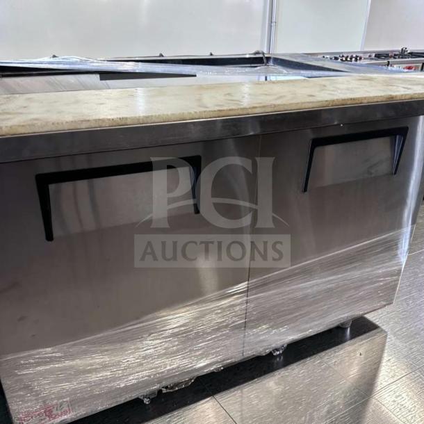 True TSSU-48-18M-B-HC Mega Top Prep Table in outstanding condition; refrigerated base, fully tested and operational.