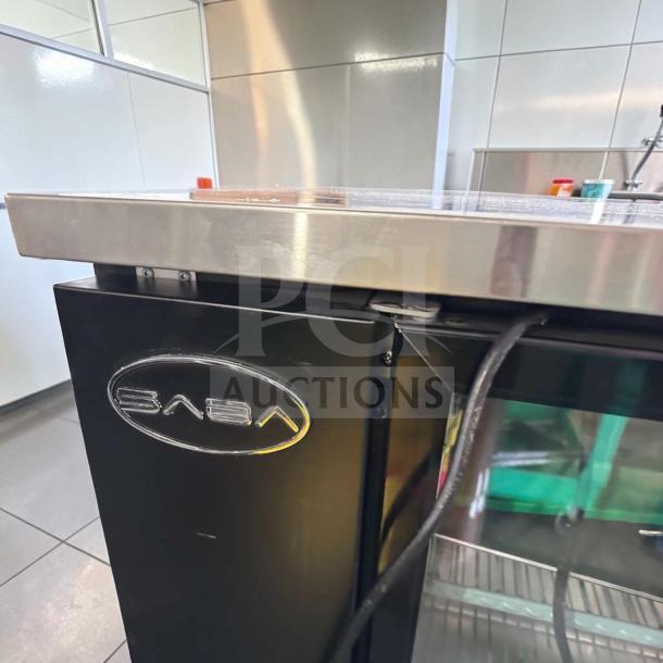 SABA 60" Commercial Back Bar Cooler, glass doors, stainless steel, 15.8 Cu. Ft., superior condition, SABA logo visible.