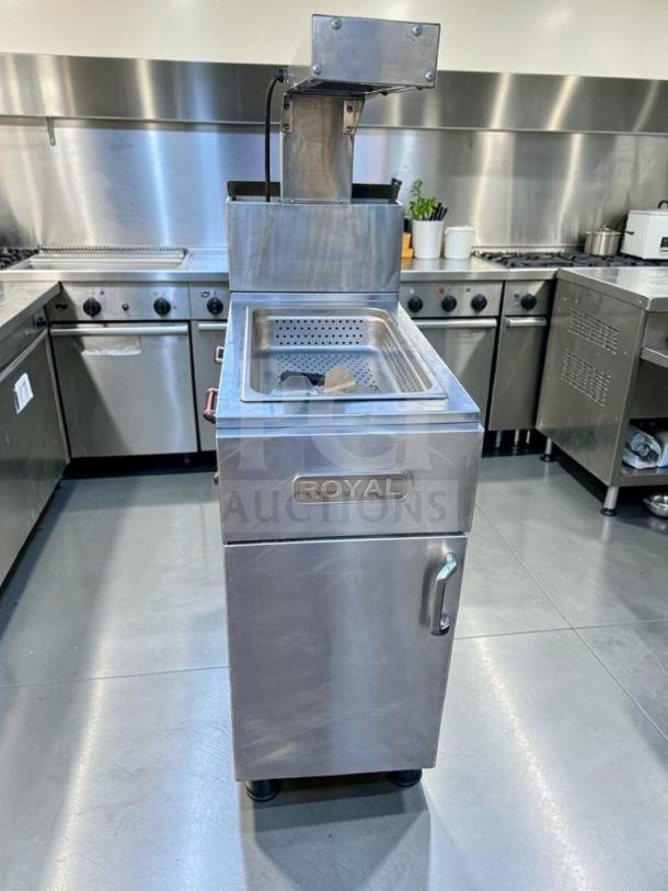 Royal Range stainless steel commercial fryer base/dump station in top-tier condition, model ROY-M-FRY-0915, fully operational.