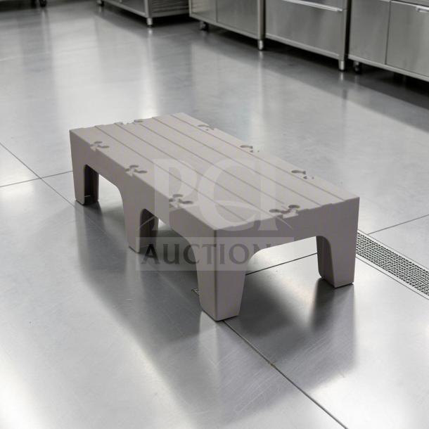 Superior condition Cambro dunnage rack, 12"x48"x21", heavy-duty polypropylene, 3,000 lb capacity, ideal for commercial storage.