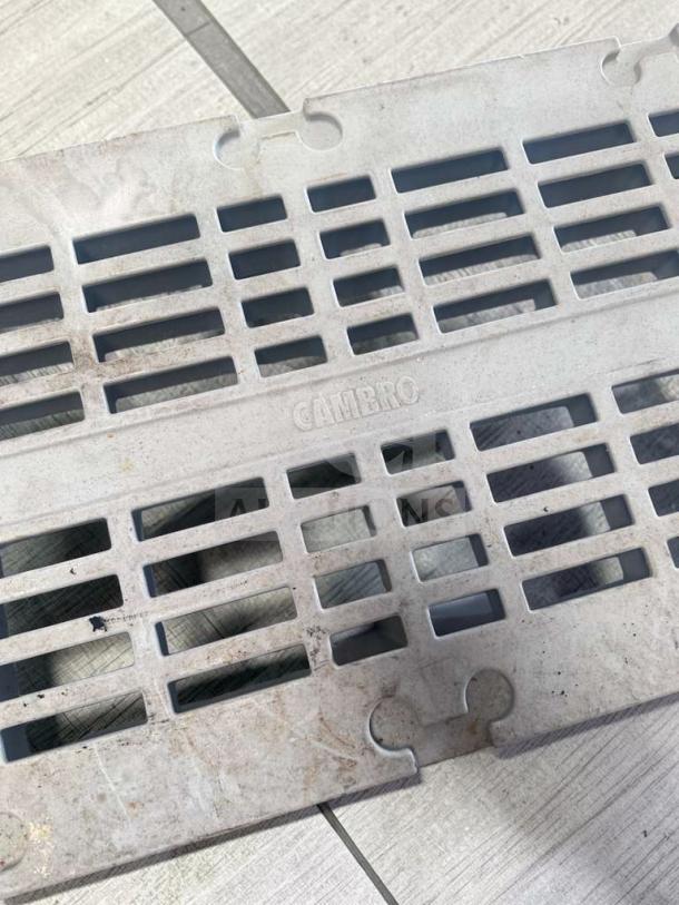 Cambro IBS Dunnage Rack, 12"x48"x21", heavy-duty polypropylene, superior condition, CAMBRO label visible, 3,000 lb capacity.