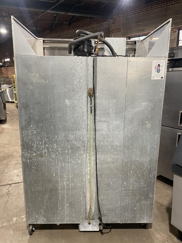 Continental Commercial 2 Door Reach-In Refrigerator, Model 2R, stainless steel, poly-coated wire racks, on casters, 115V.