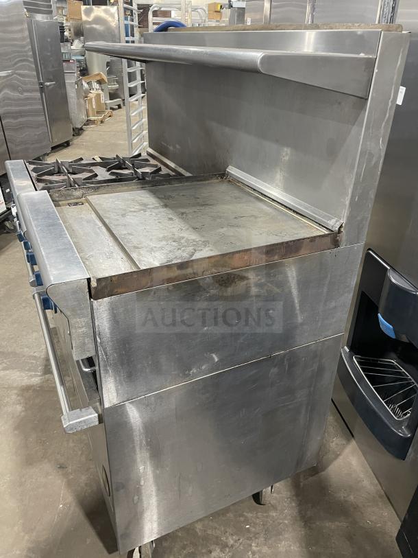 US Range PX-6-24BG-2626 commercial stainless steel griddle/broiler with 6-burner range and 2 ovens, on casters.