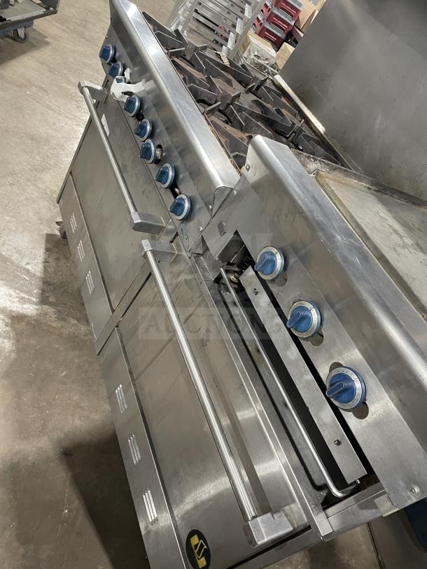 Us Range stainless steel griddle/broiler with 6-burner range, two ovens, model PX-6-24BG-2626, natural gas, on casters.